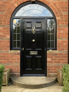 External wooden door with glass design